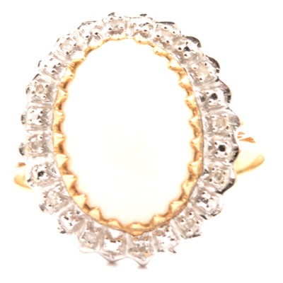 Lot 42 - An opal and diamond cluster ring.