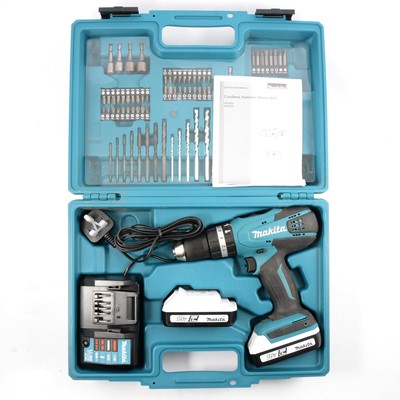 Lot 243 - Makita 18v cordless hammer driver drill, charger and two batteries cased with bits and another empty Makita case.