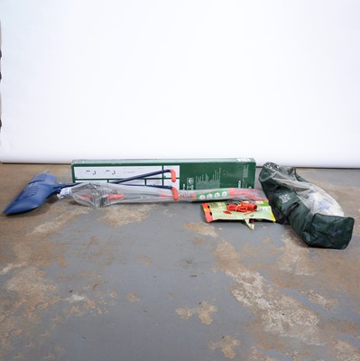 Lot 299 - A box of various garden tools including a leaf...