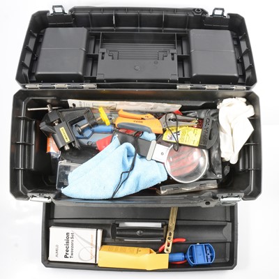 Lot 116 - Plastic crate and Stanley tool box of modern watch tools and accessories including cleaning fluids, wire wool, etc.