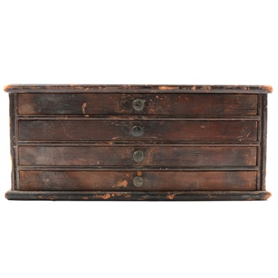 Lot 122 - Plastic crate and wooden four drawer chest of small watch parts
