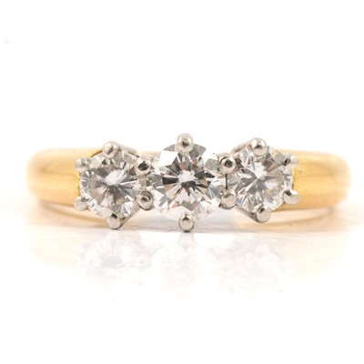 Lot 13 - A diamond three stone ring.