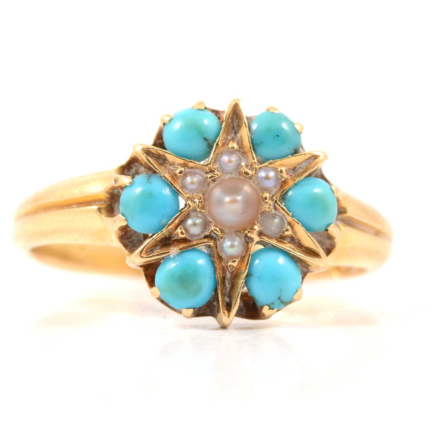 Lot 54 - A turquoise and seed pearl dress ring.