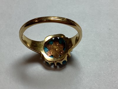 Lot 54 - A turquoise and seed pearl dress ring.