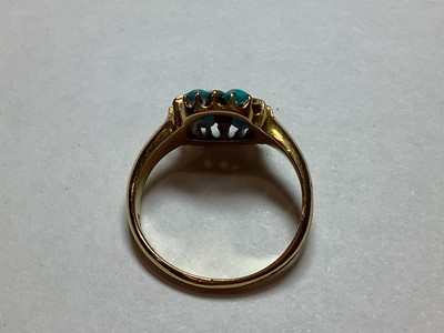 Lot 54 - A turquoise and seed pearl dress ring.
