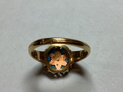 Lot 54 - A turquoise and seed pearl dress ring.