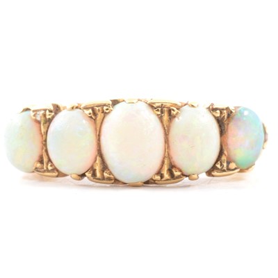 Lot 43 - An opal half hoop ring.