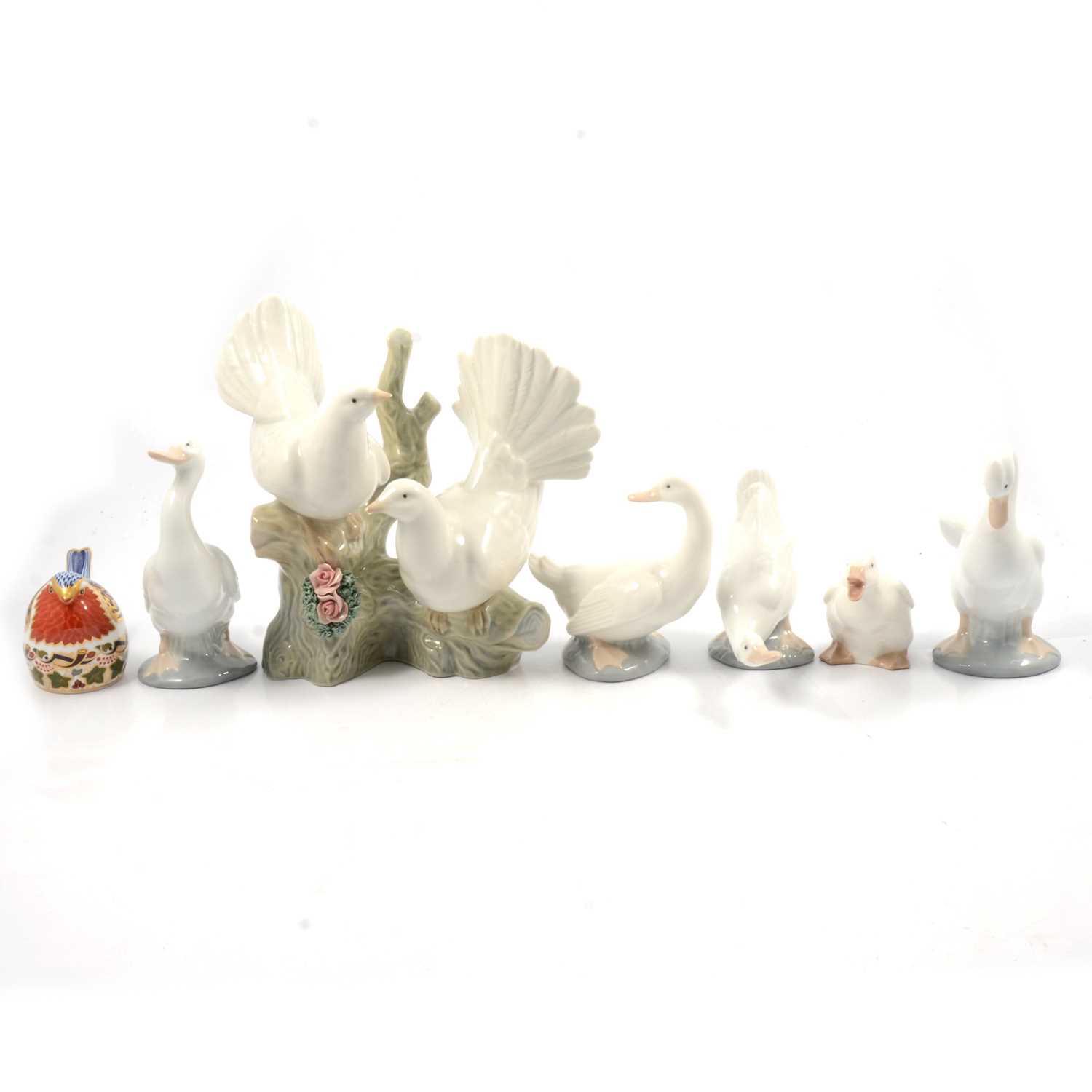 Lot 16 - Royal Crown Derby paperweight and Spanish models