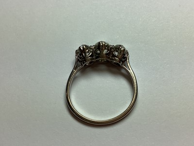 Lot 1 - A diamond three stone ring.