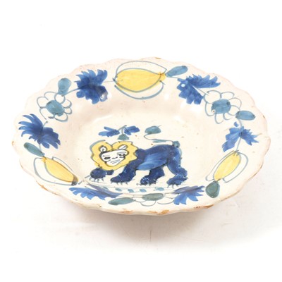 Lot 2 - English Delft bowl, hand-painted with a lion