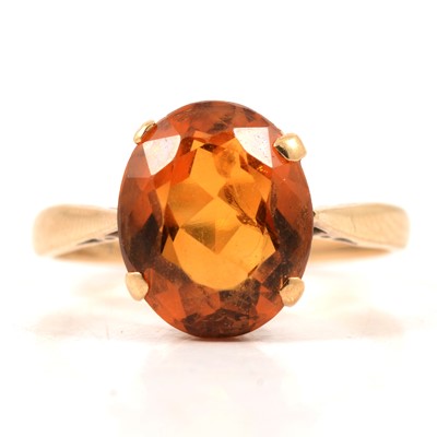 Lot 59 - A citrine dress ring.