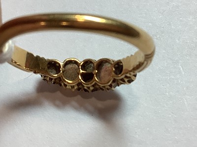 Lot 51 - An opal and diamond half hoop ring.
