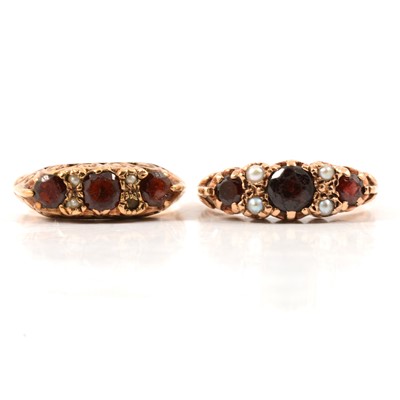 Lot 31 - Two garnet reproduction Victorian half hoop rings.