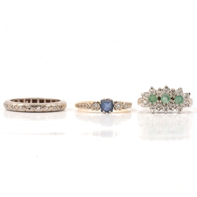 Lot 61 - Three gemset rings.