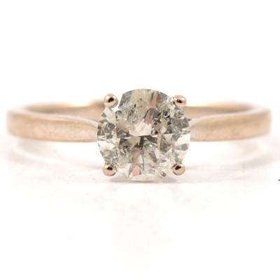 Lot 5 - A diamond solitaire ring.
