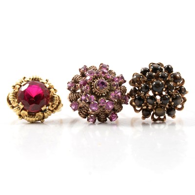 Lot 65 - Three gemset rings.