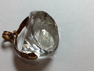 Lot 69 - An 18 carat gold signet ring and crystal intaglio seal - Leijonhfvud family crest.