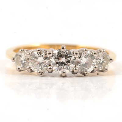 Lot 13 - A diamond five stone ring.