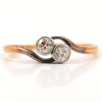 Lot 11 - A diamond two stone crossover ring