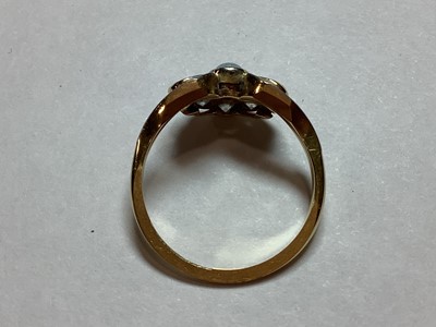 Lot 48 - An opal and diamond fan shaped ring.
