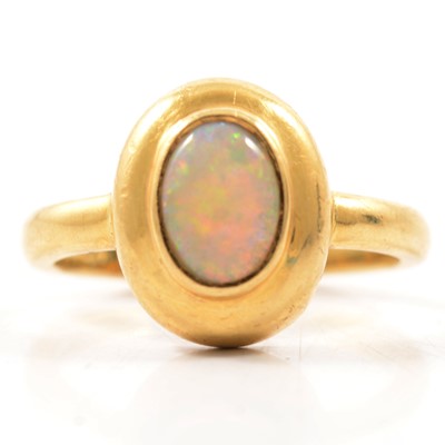 Lot 52 - An opal dress ring.