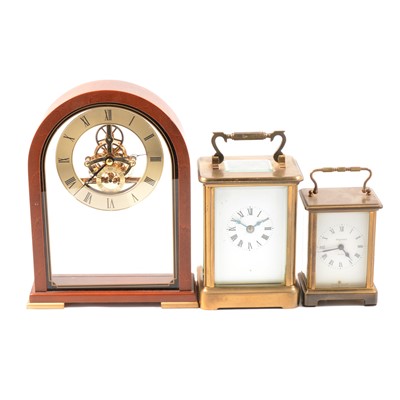 Lot 157 - Two brass carriage clocks and a modern mantel clock.