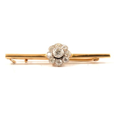 Lot 150 - A diamond cluster bar brooch.