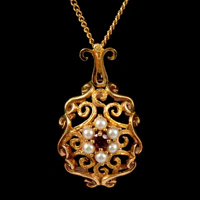 Lot 221 - A garnet and pearl pendant and chain.