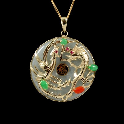 Lot 189 - A jade type pendant and chain.