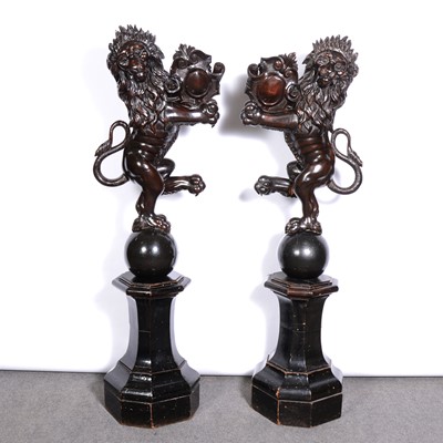 Lot 244 - Pair of Victorian ebonised armorial lions