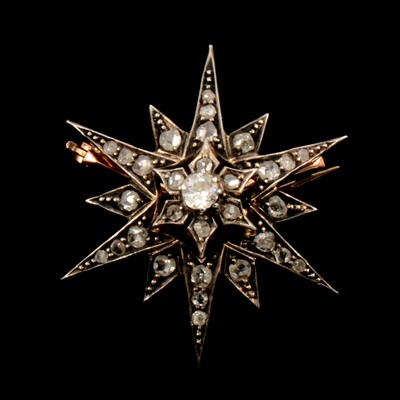 Lot 149 - A Victorian diamond star brooch/pendant.