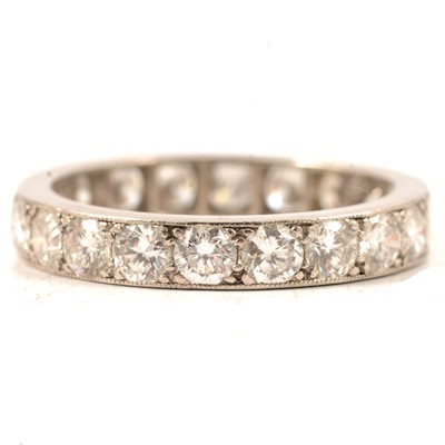 Lot 30 - A diamond full eternity ring.
