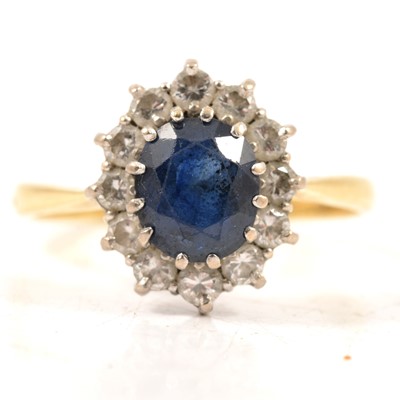 Lot 46 - A sapphire and diamond cluster ring