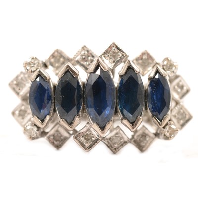 Lot 51 - A sapphire and diamond half hoop ring.