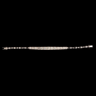 Lot 189 - A thirteen stone diamond bracelet.