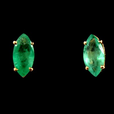 Lot 140 - A pair of emerald marquise cut earstuds