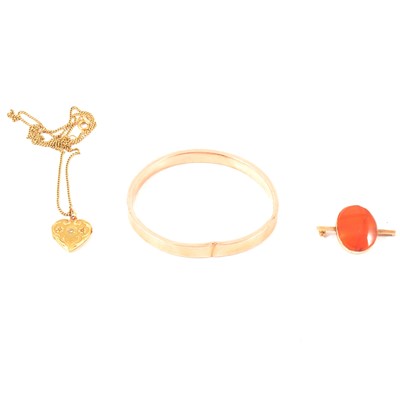 Lot 235 - A 9 carat gold slave bangle, cornelion brooch, heart pendant, all with some damage.