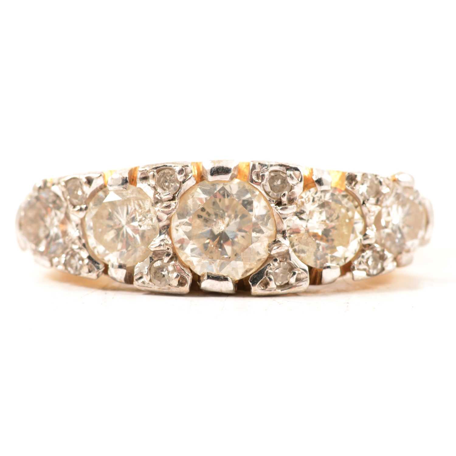Lot 18 - A diamond five stone reproduction Victorian clarved claw ring.