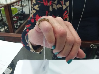 Lot 18 - A diamond five stone reproduction Victorian clarved claw ring.