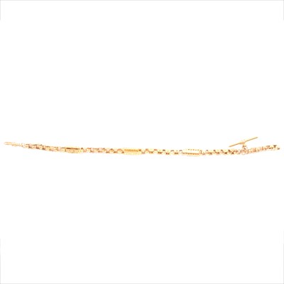 Lot 259 - A yellow metal single Albert watch chain.