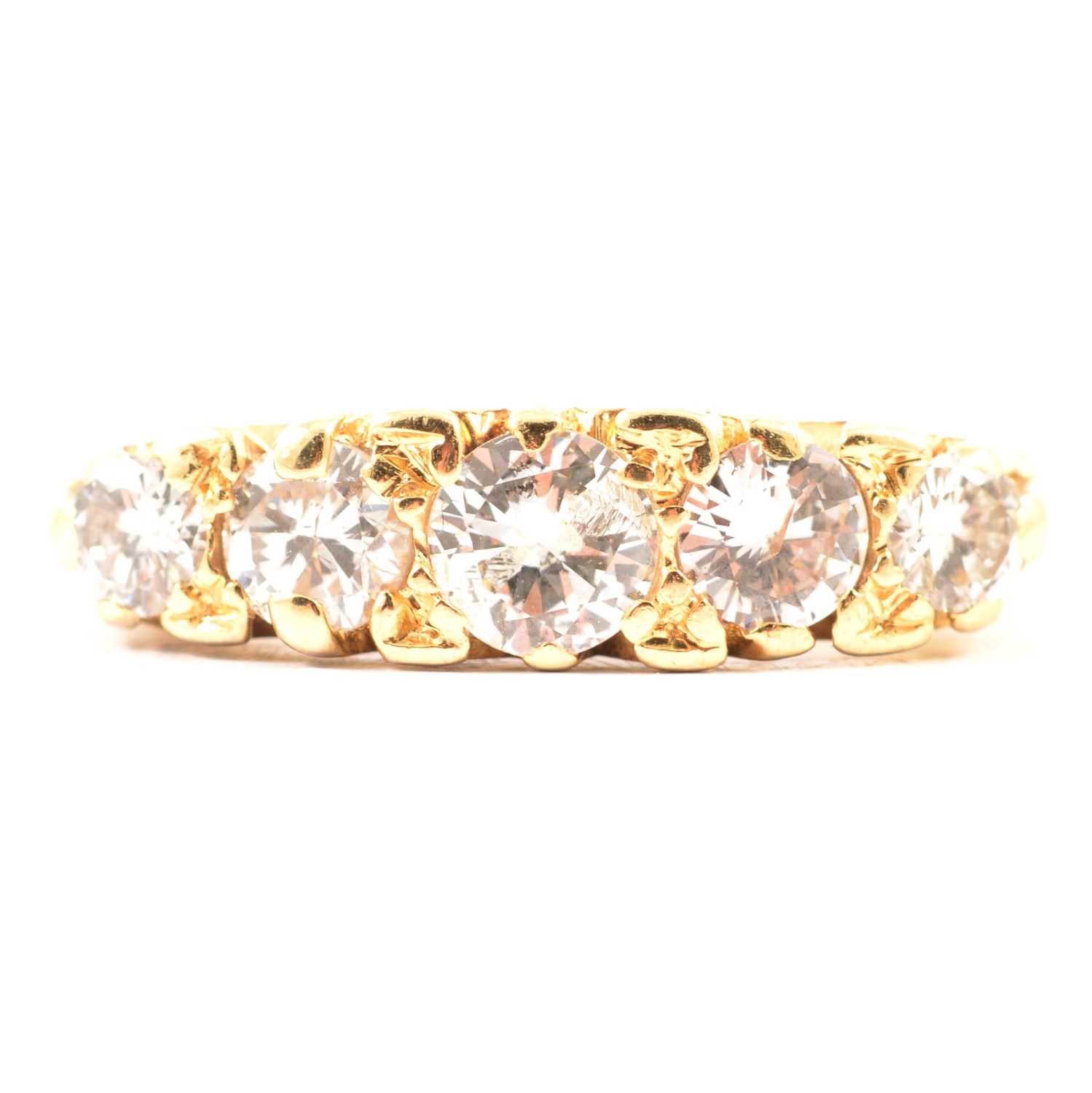 Lot 19 - A diamond five stone ring.
