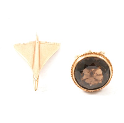 Lot 254 - A vintage 9 carat gold Concorde charm and seal.
