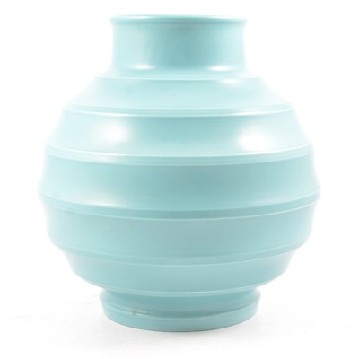 Lot 40 - Keith Murray for Wedgwood, a large ribbed globe 'Football' vase, post 1940, matt blue glaze
