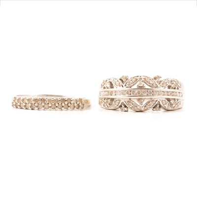 Lot 27 - A diamond half hoop ring and diamond eternity ring.