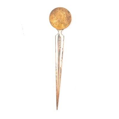 Lot 127 - A Silver Jubilee silver letter opener, Stuart Devlin, London 1977, in fitted case.
