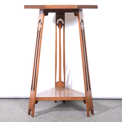 Lot 20 - An Arts and Crafts oak octagonal occasional table, and a corner table