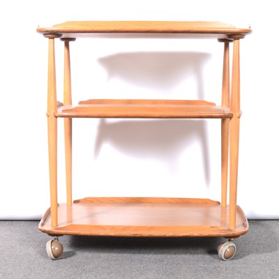 Lot 107 - Ercol, a three-tier tea trolley
