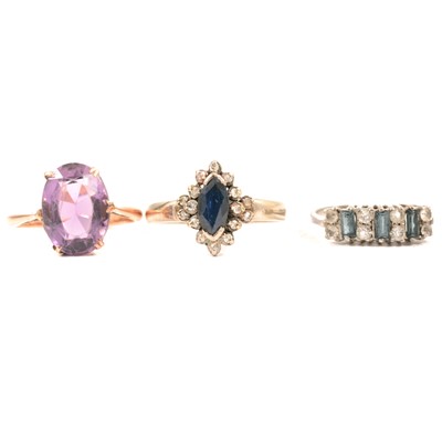 Lot 54 - Three dress rings.