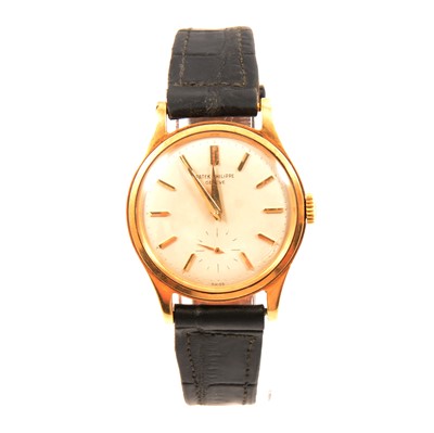 Lot 309 - Patek Philippe - a gentleman's yellow metal wristwatch.
