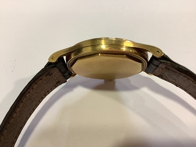 Lot 309 - Patek Philippe - a gentleman's yellow metal wristwatch.